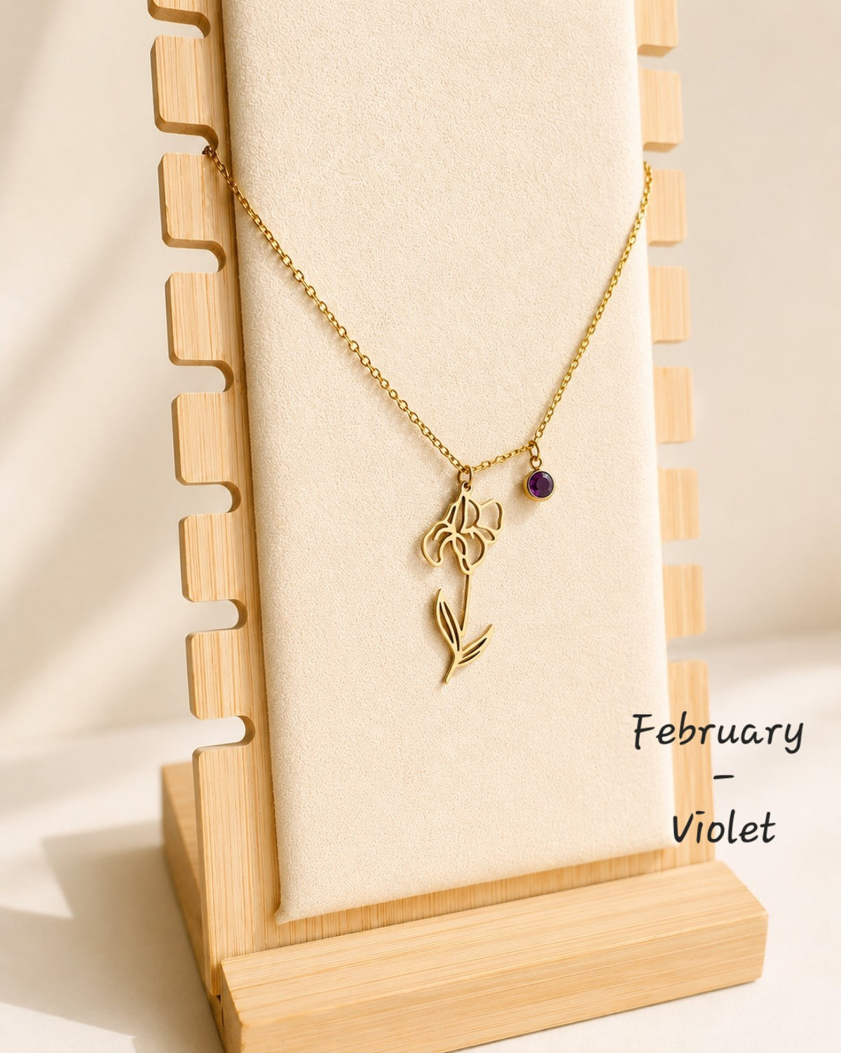Minimalist birth flower necklace with matching birthstone and waterproof finish.
