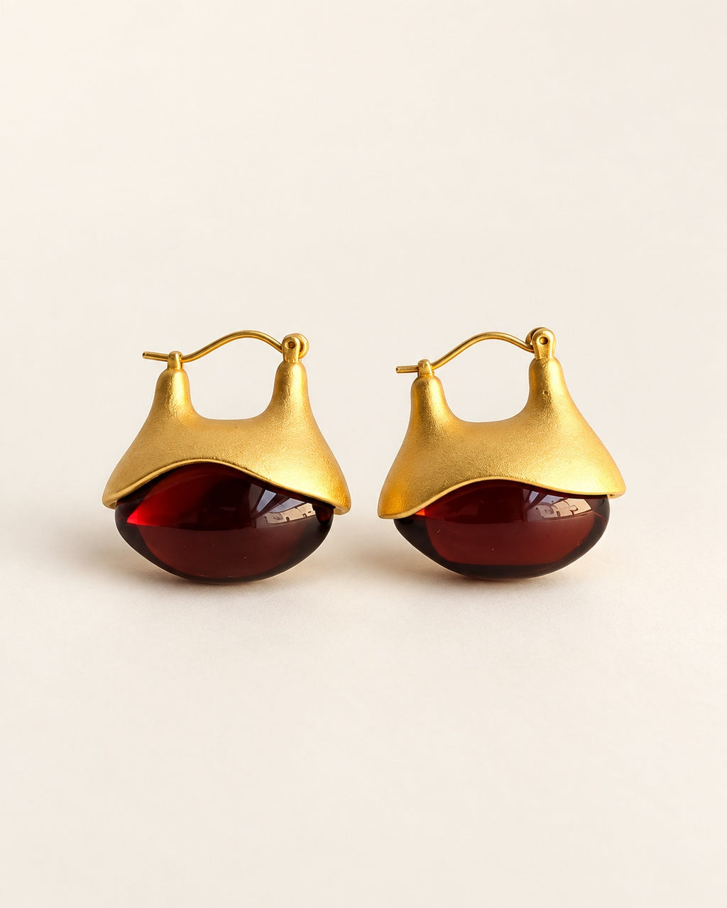 Amber drop earrings with warm golden brown gemstone