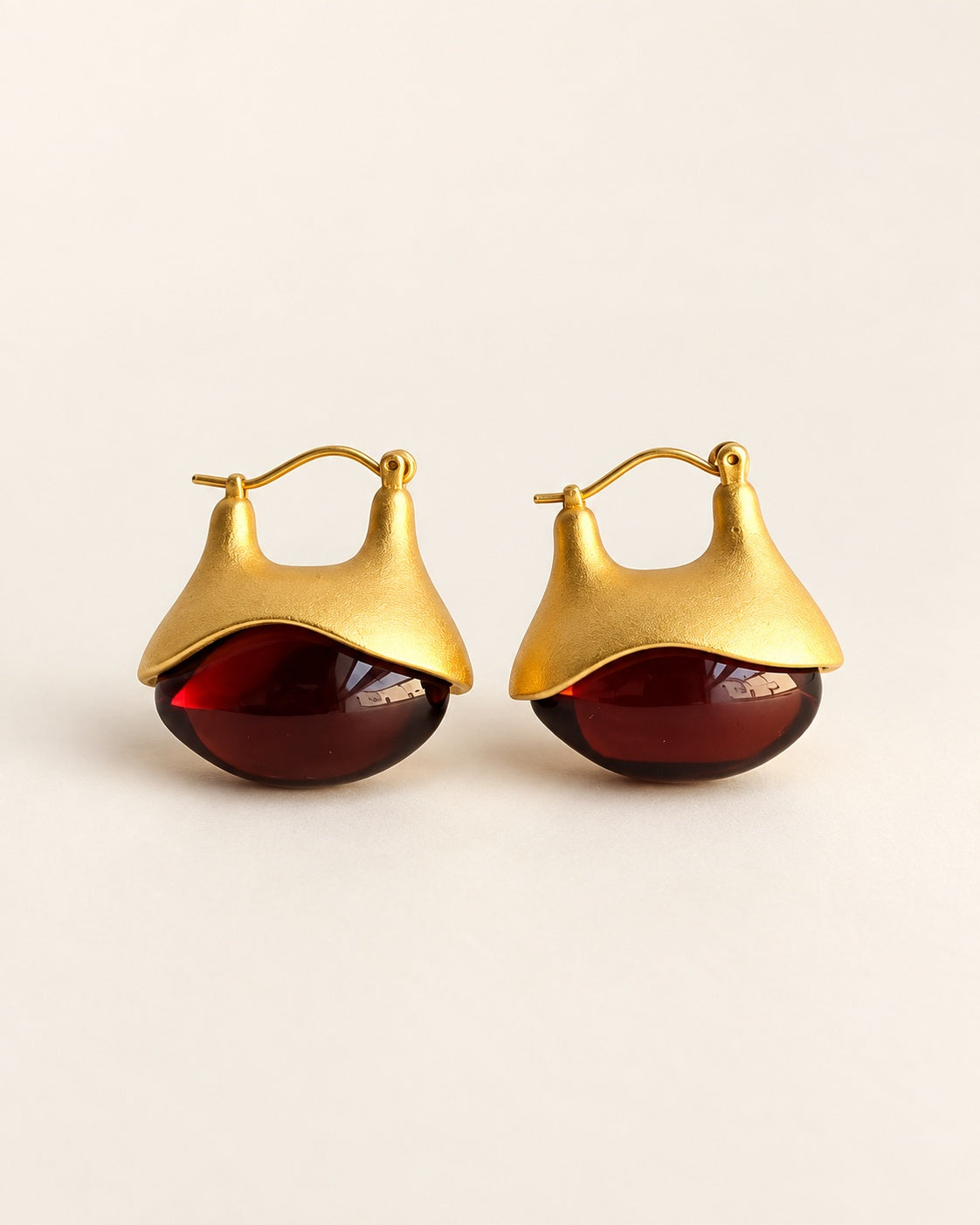 Amber drop earrings with warm golden brown gemstone