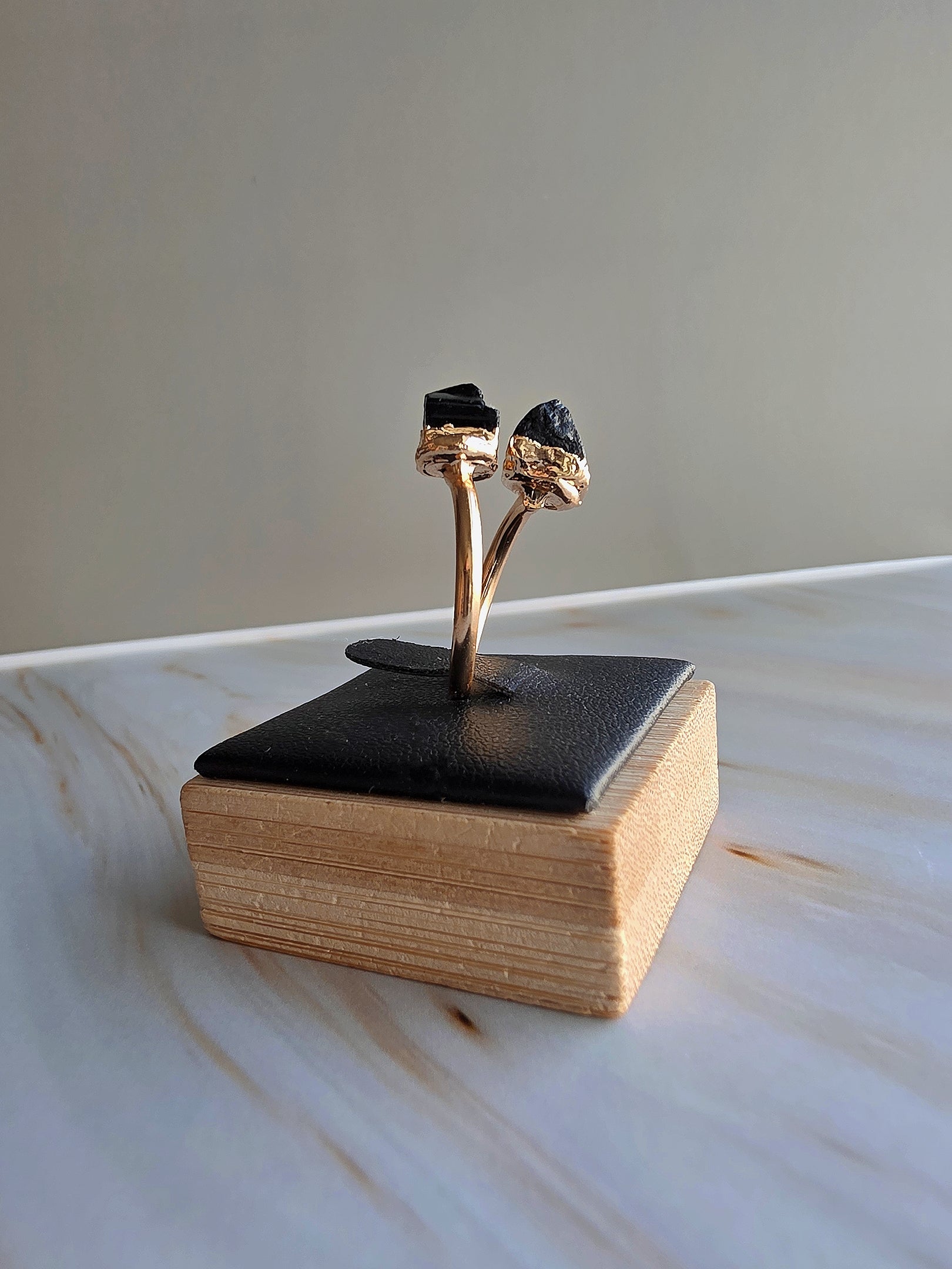 Elegant adjustable statement ring featuring natural black tourmaline.
