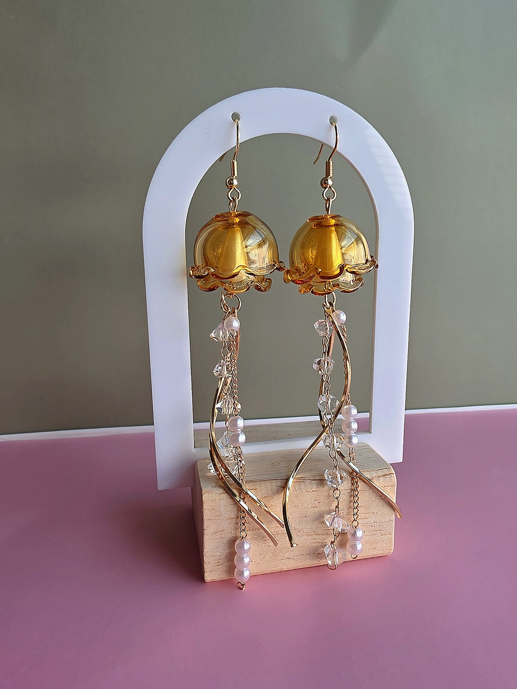 Women's ocean-themed jellyfish drop earrings with a polished finish.