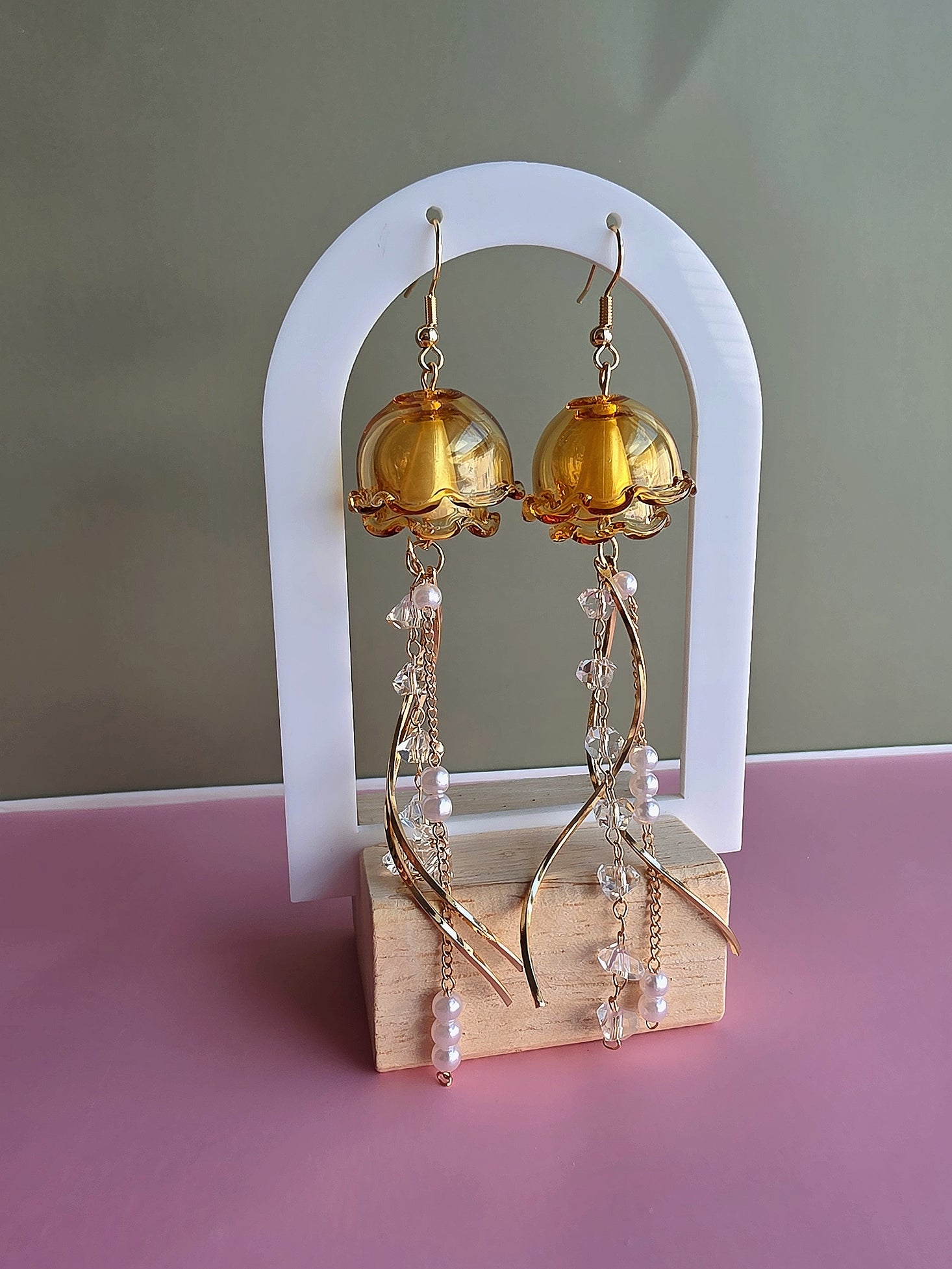 Women's ocean-themed jellyfish drop earrings with a polished finish.