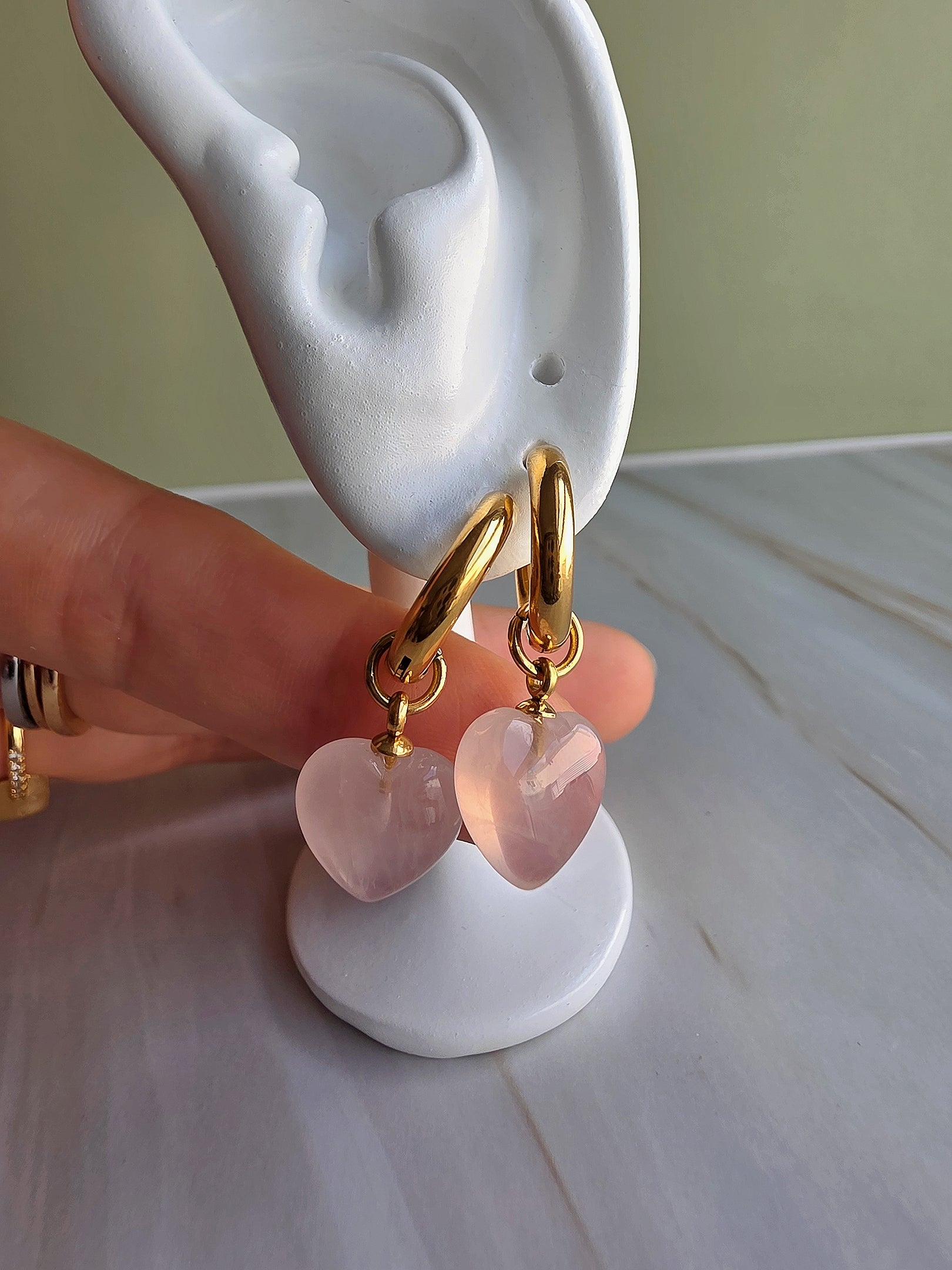 Natural pink rose quartz heart earrings for everyday wear and special occasions.