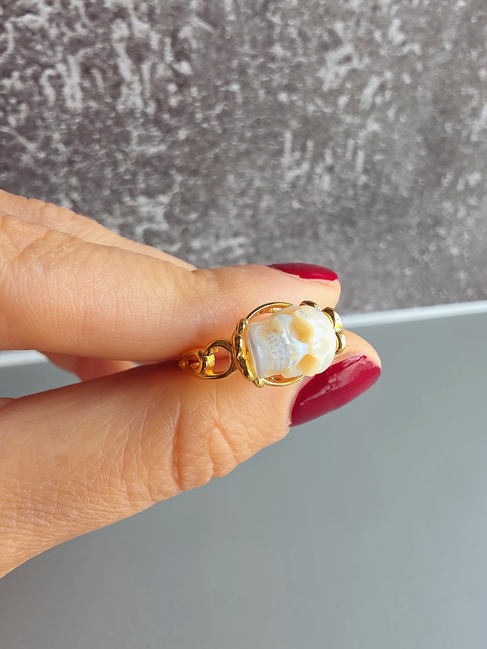 Gothic adjustable pearl skull ring for women.