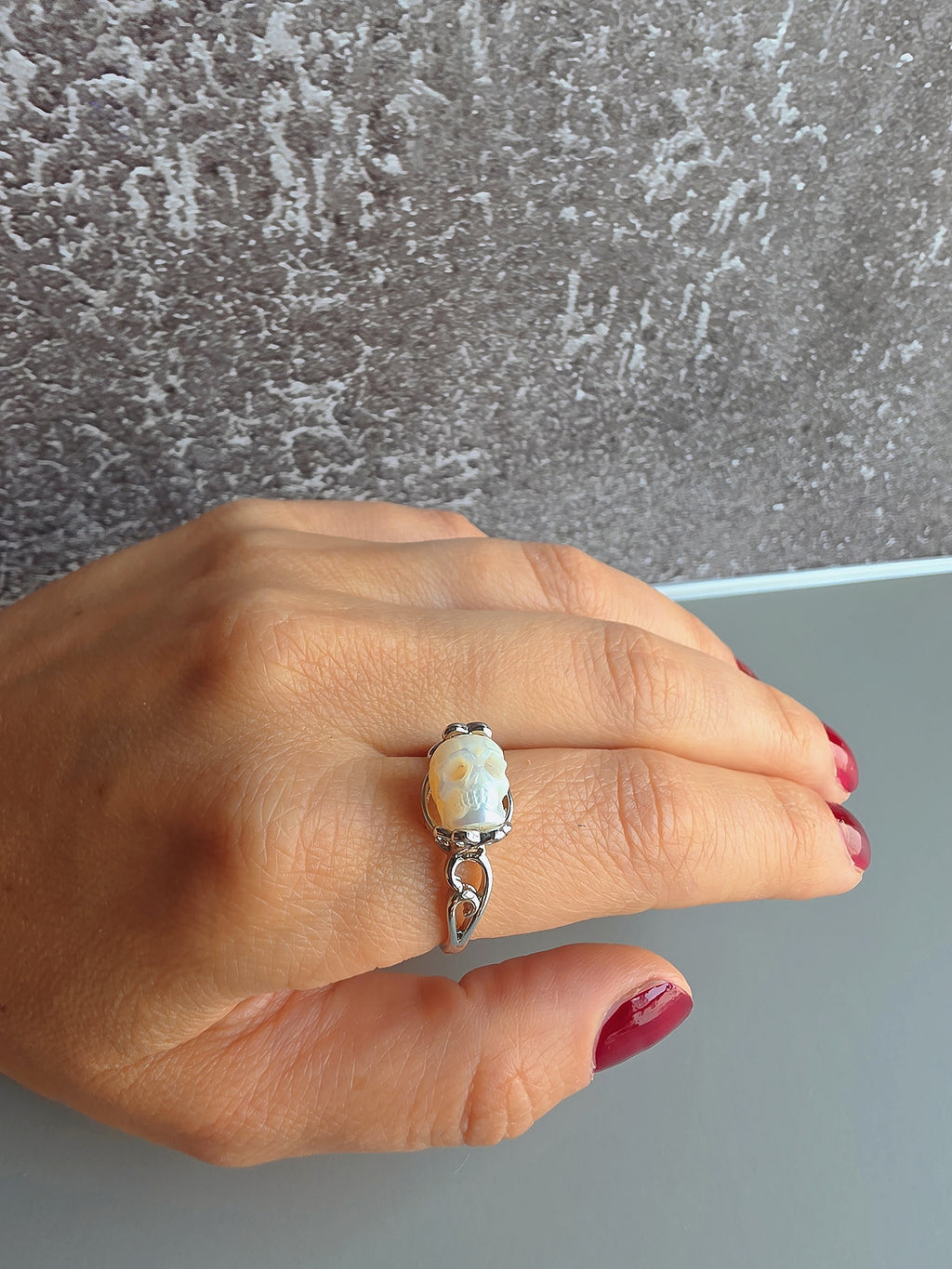 Adjustable 925 sterling silver pearl skull statement ring.
