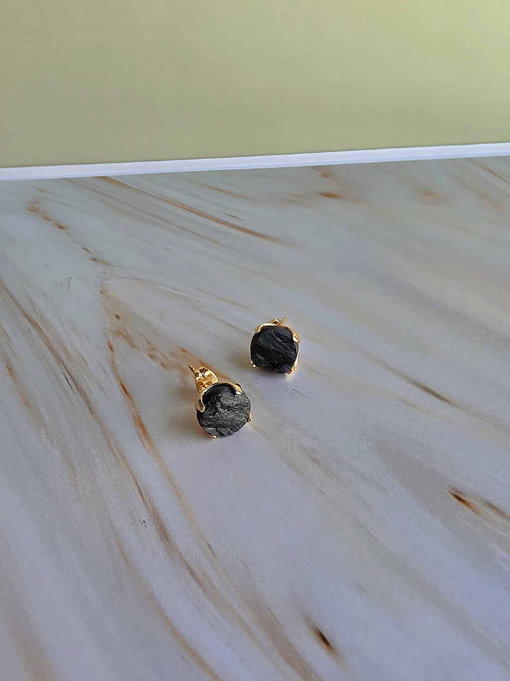 Natural black tourmaline earrings featuring rough-cut healing crystal stones.
