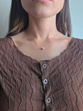 Minimalist single pearl choker necklace with 18K gold plating.