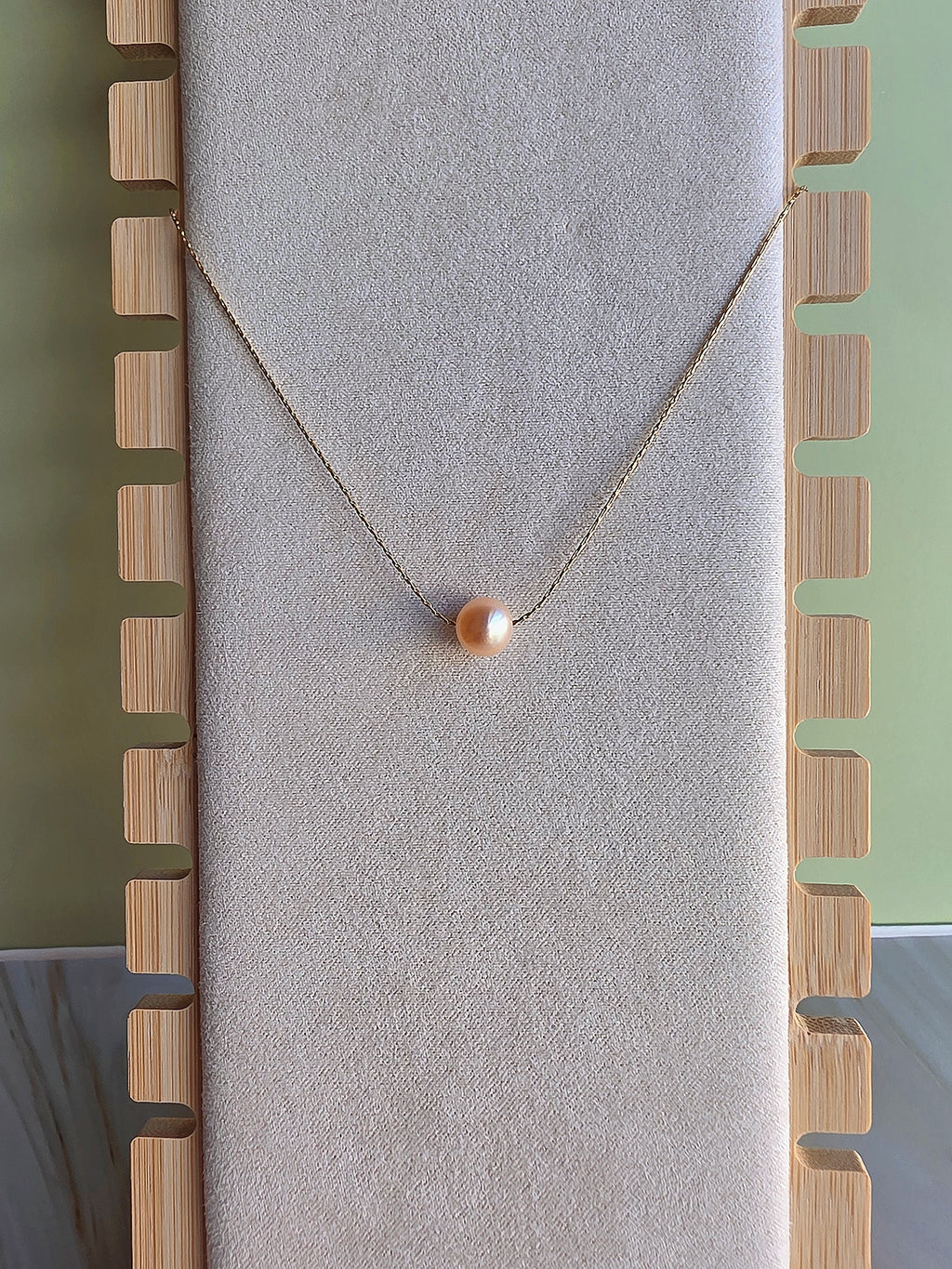 Freshwater pearl choker necklace available in white, pink, black, or blue pearls.