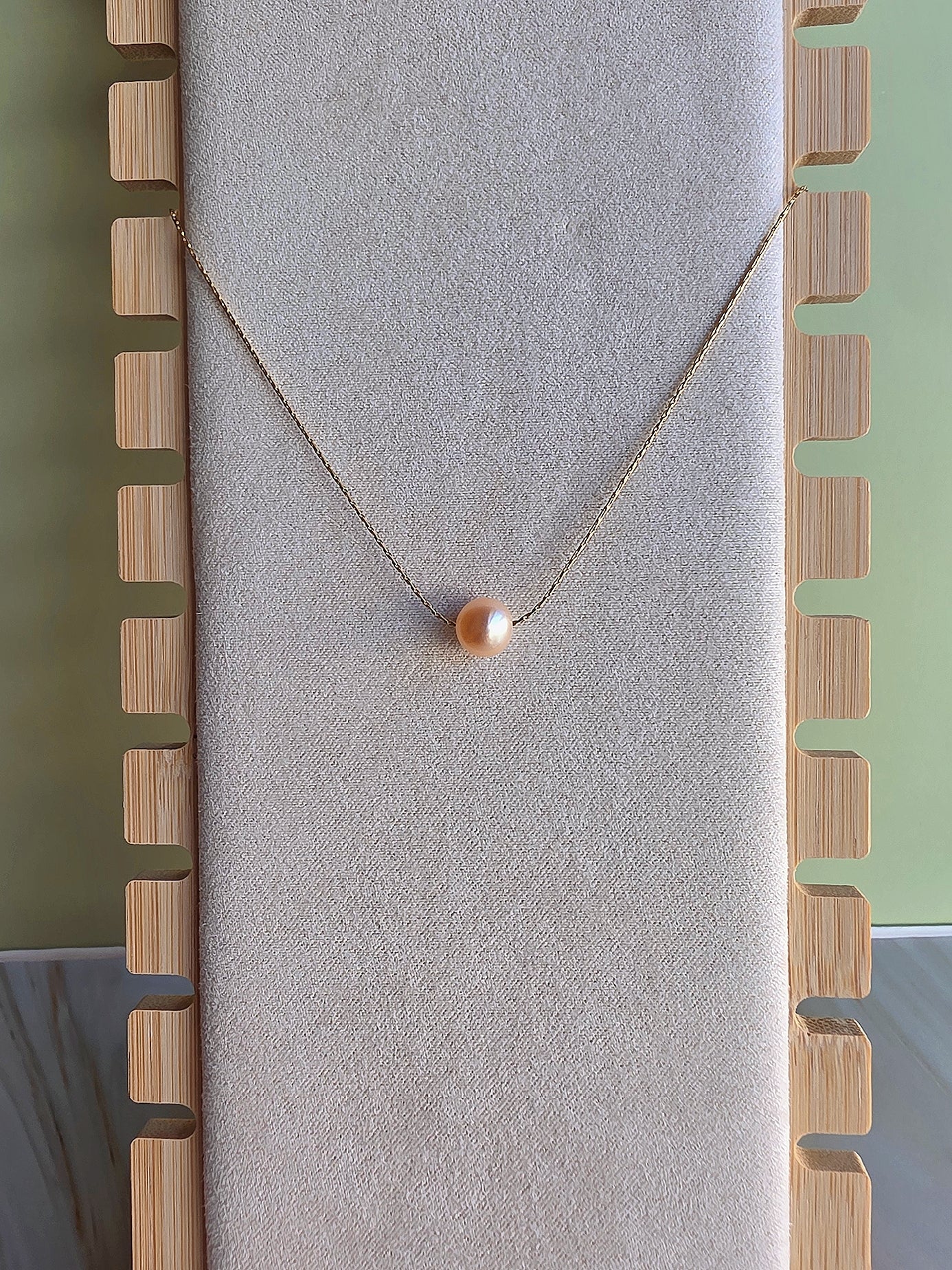 Freshwater pearl choker necklace available in white, pink, black, or blue pearls.