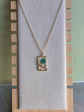 Rectangle botanical flower pendant necklace.