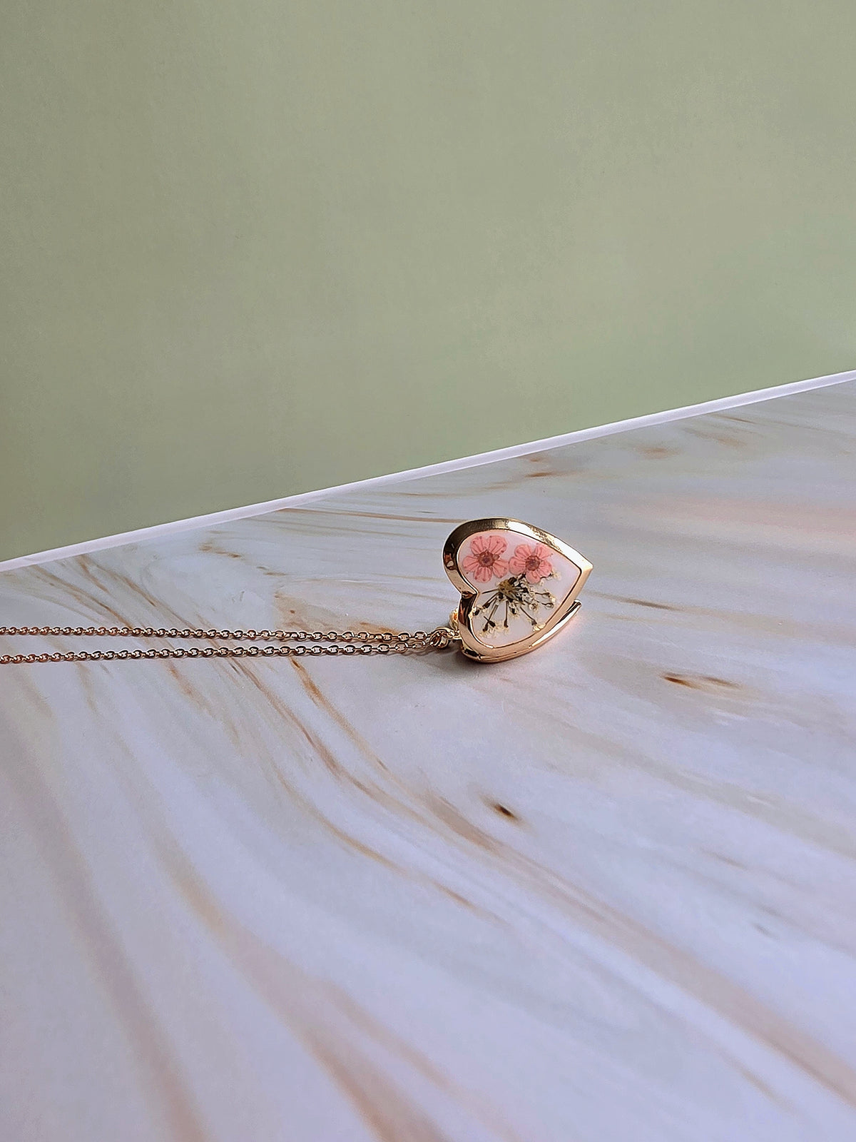Real pressed flower heart pendant necklace for everyday wear.