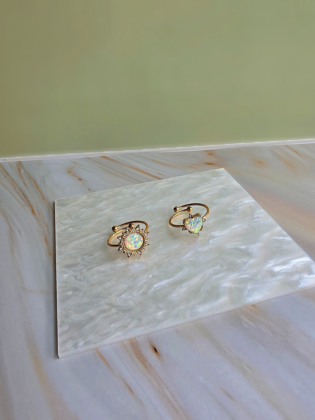 Sunflower and heart fire opal rings for women with an elegant vintage-inspired design.