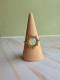 Women's 18K gold-plated opal statement rings with celestial-inspired details.