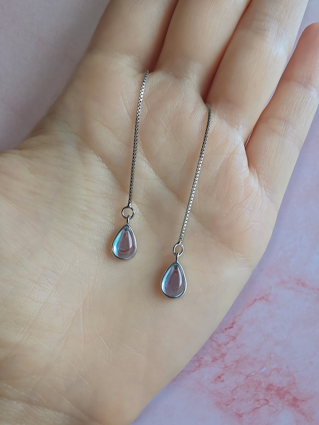 925 sterling silver threader earrings featuring elegant blue moonstone gemstones.