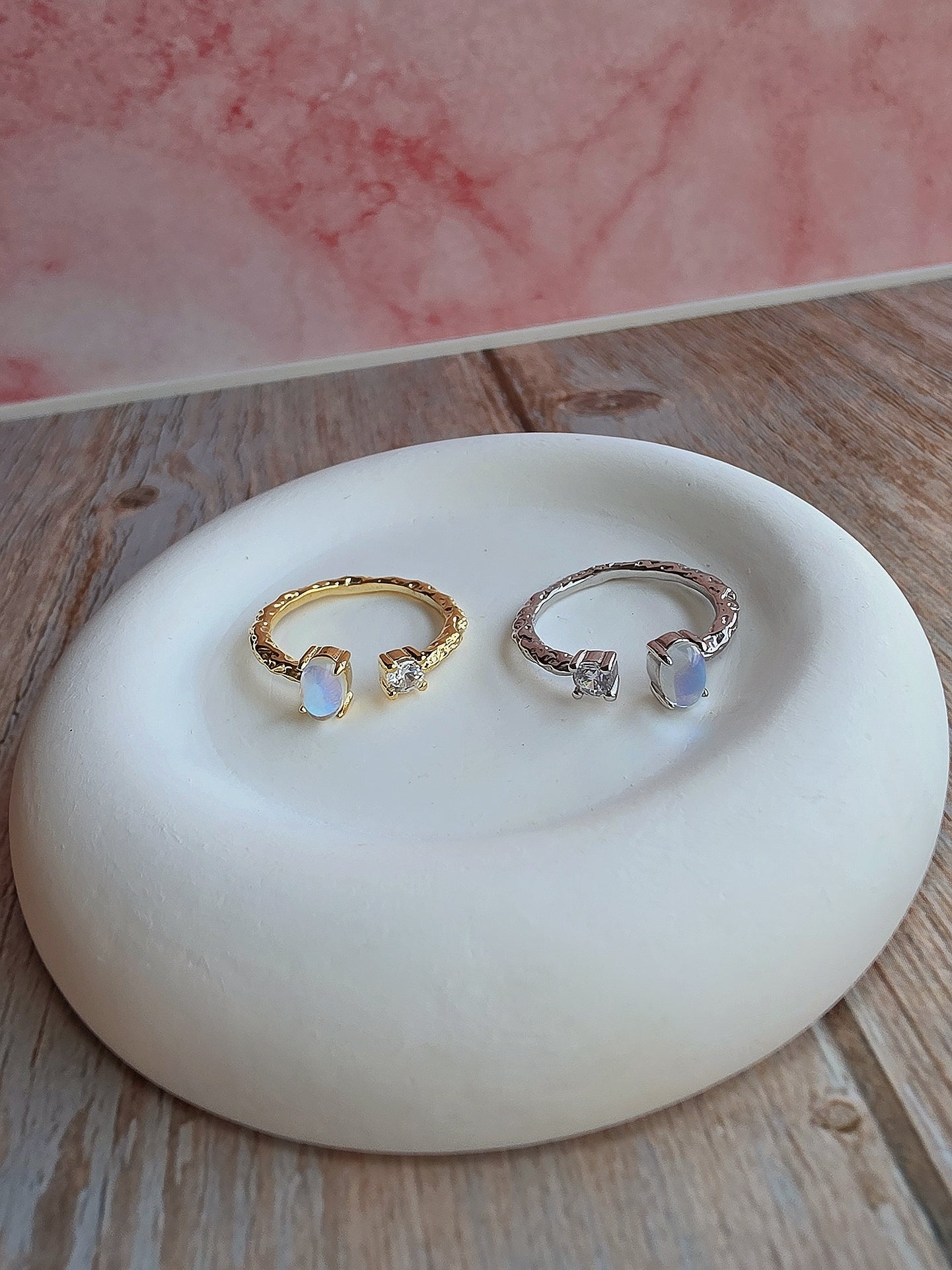 Elegant rainbow moonstone statement ring with an adjustable open band.