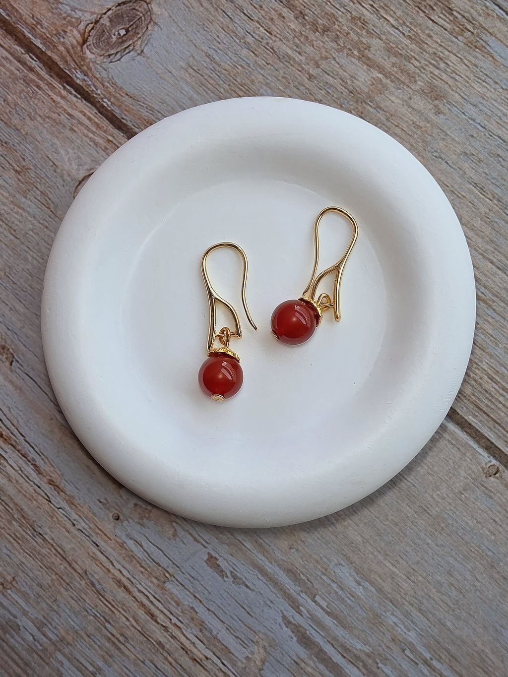 Natural gemstone drop earrings available in black onyx, lapis lazuli, and red agate.