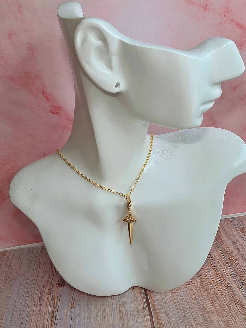 Women's 14K gold-plated dagger necklace for everyday wear and layering.