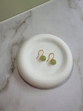 Women's green jade drop earrings for everyday wear and special occasions.