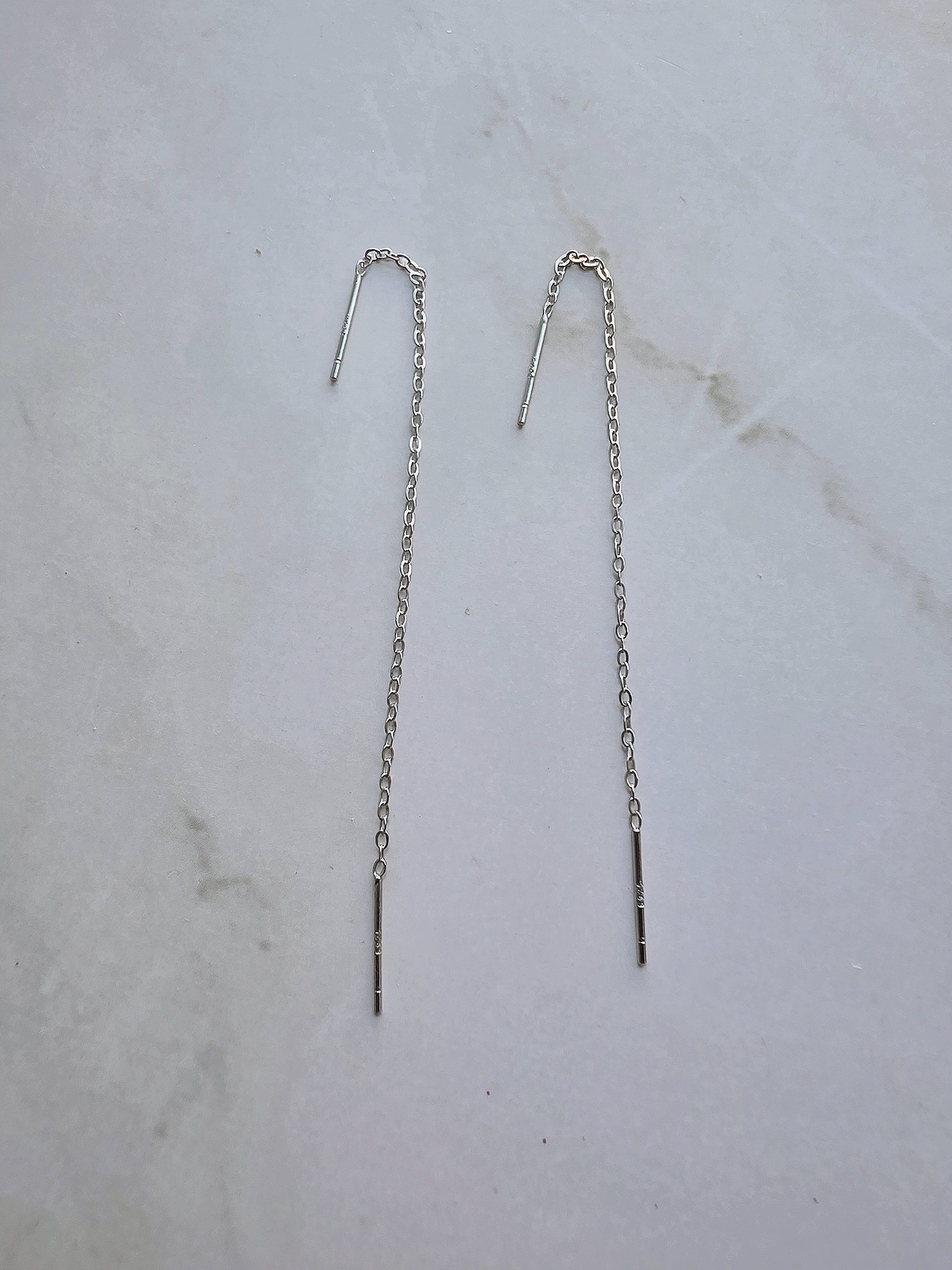 Lightweight minimalist threader chain earrings with a modern bar design.