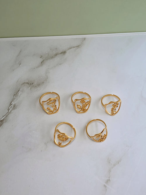 Floral statement ring inspired by birth flowers with a polished gold-plated finish.