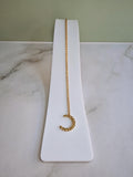 Celestial moon necklace featuring a delicate crescent moon pendant for women.