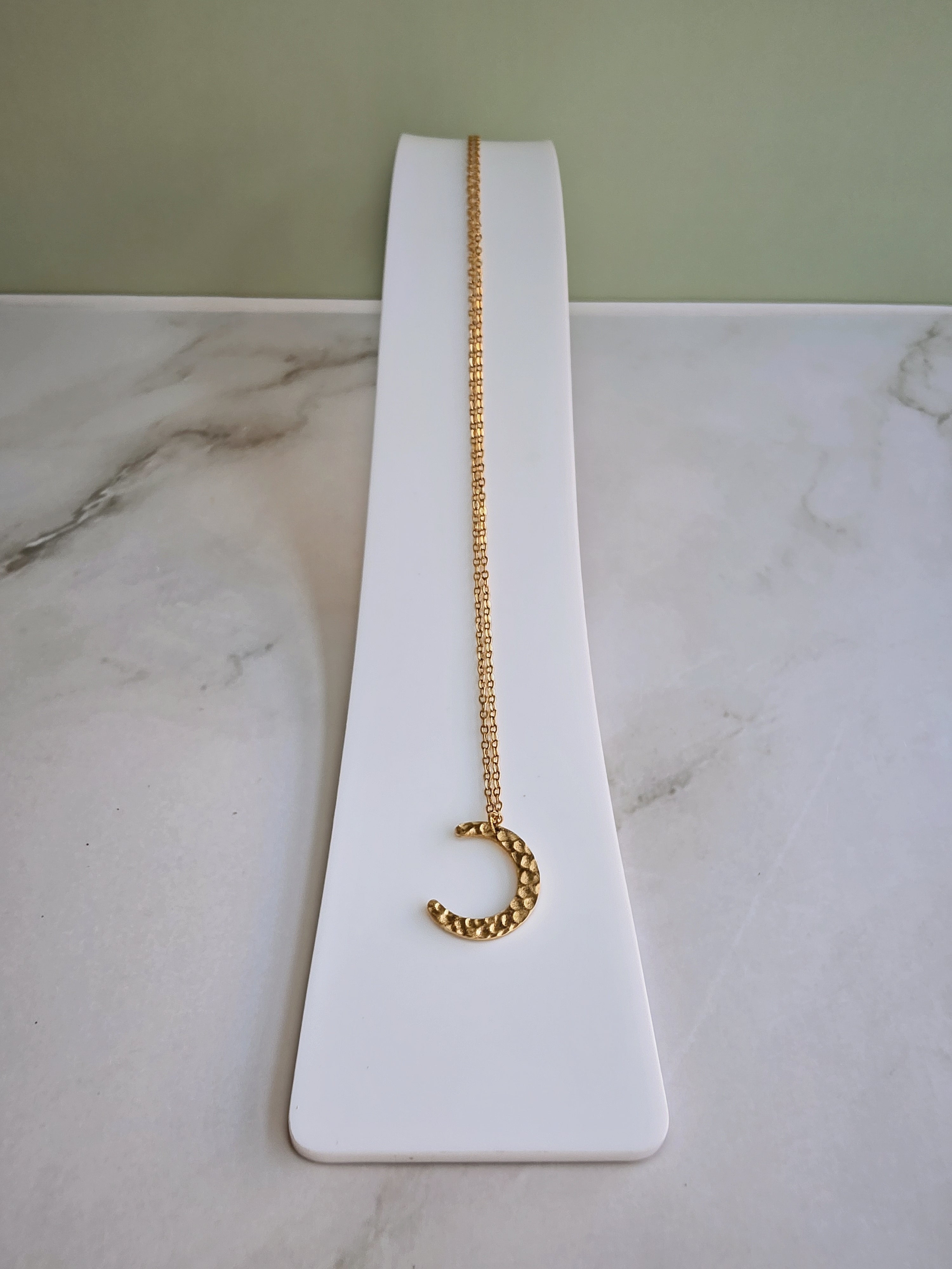 Celestial moon necklace featuring a delicate crescent moon pendant for women.