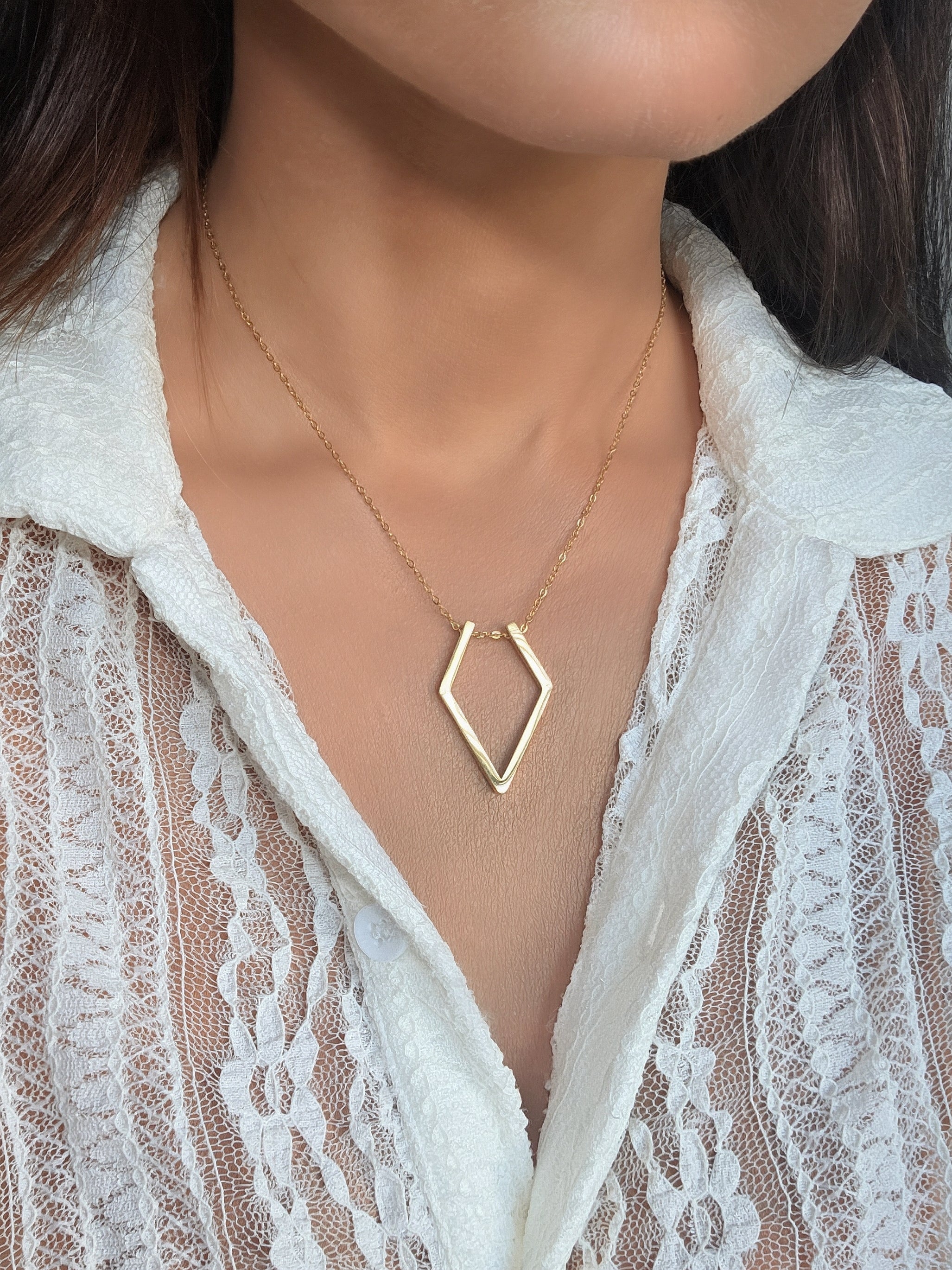 Waterproof ring keeper necklace with an elegant 18K gold-plated stainless steel design.