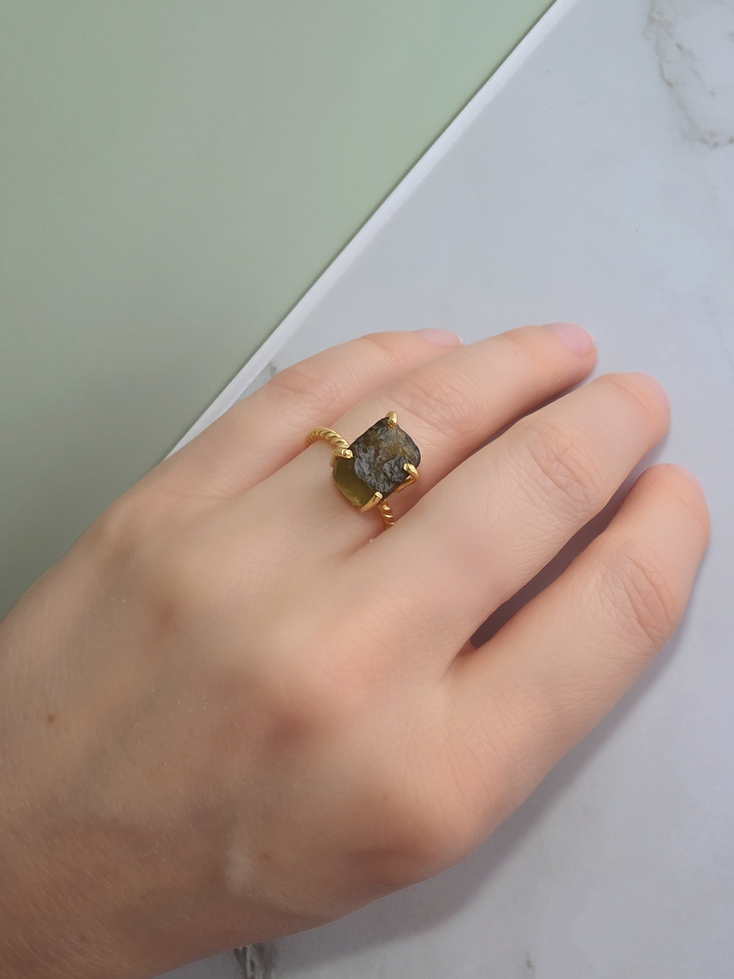 Adjustable raw moldavite ring in 18K gold plating with a one-of-a-kind natural gemstone.