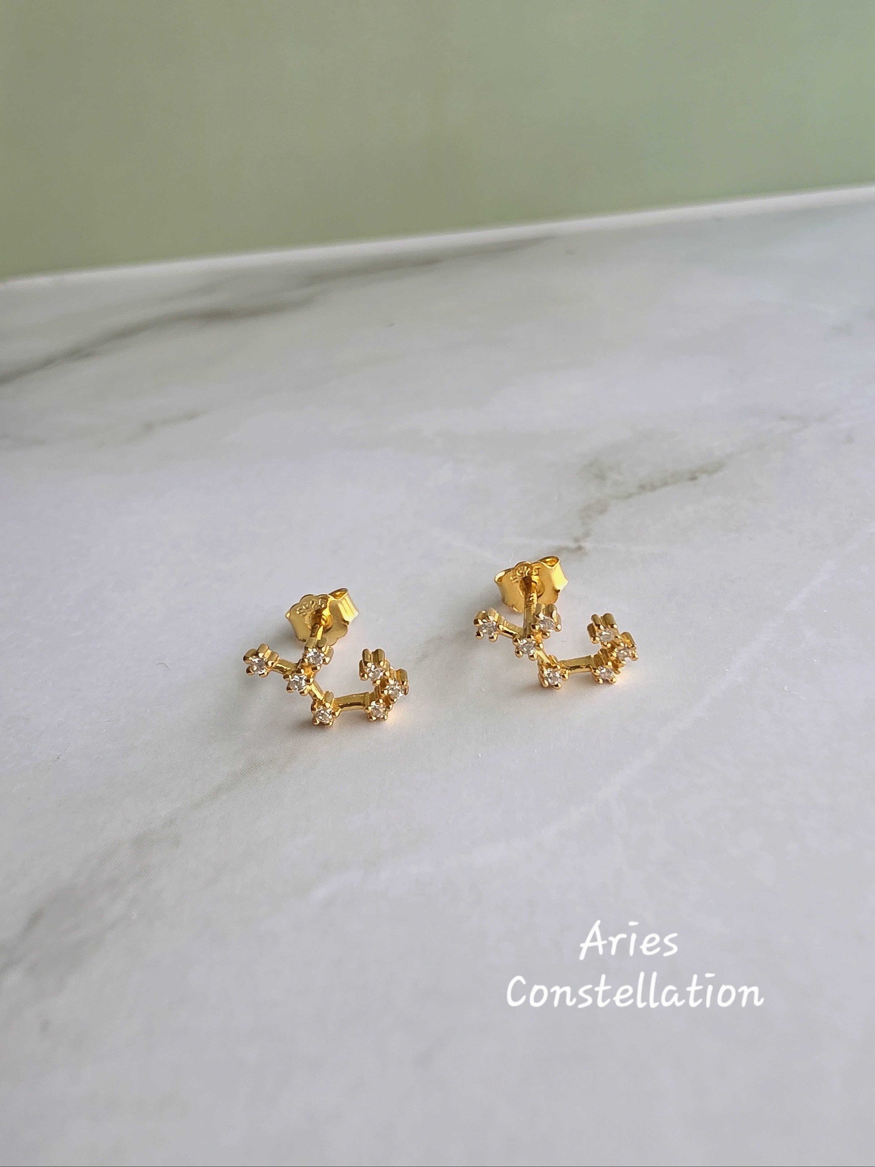 Astrology constellation earrings for everyday wear and gifting.