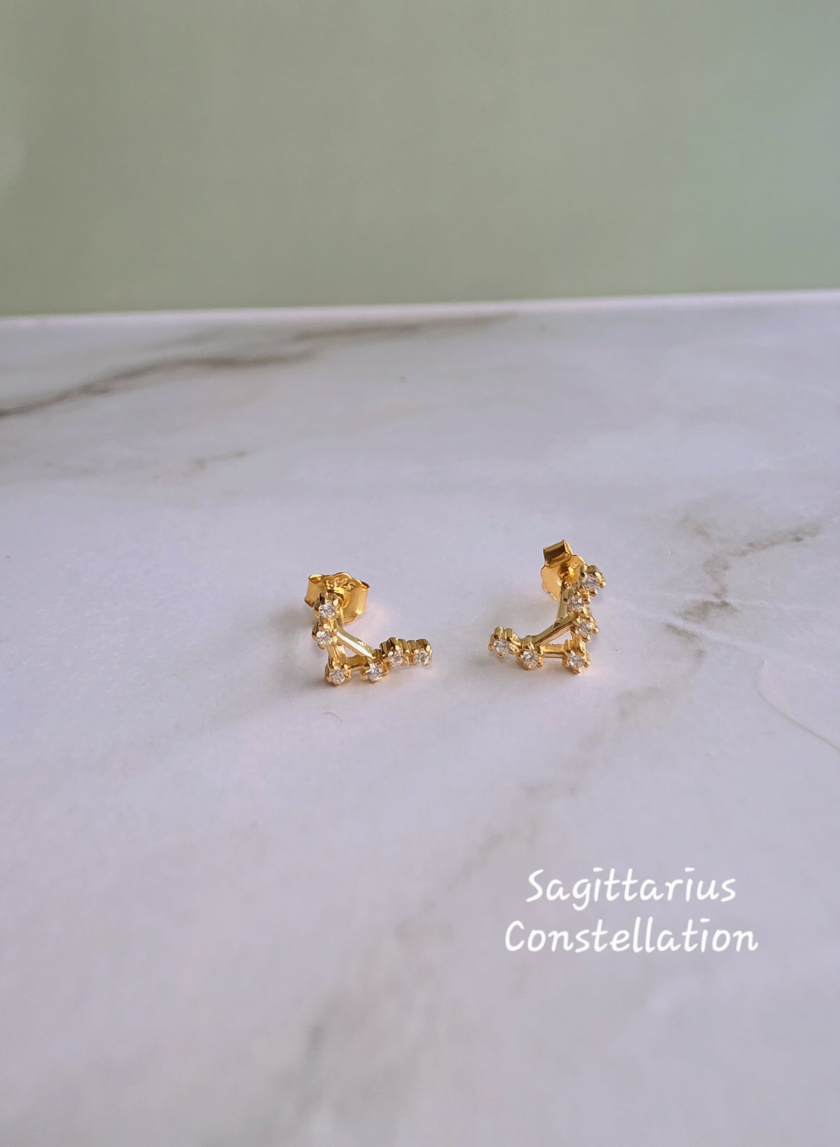 Elegant sterling silver constellation earrings for astrology lovers.