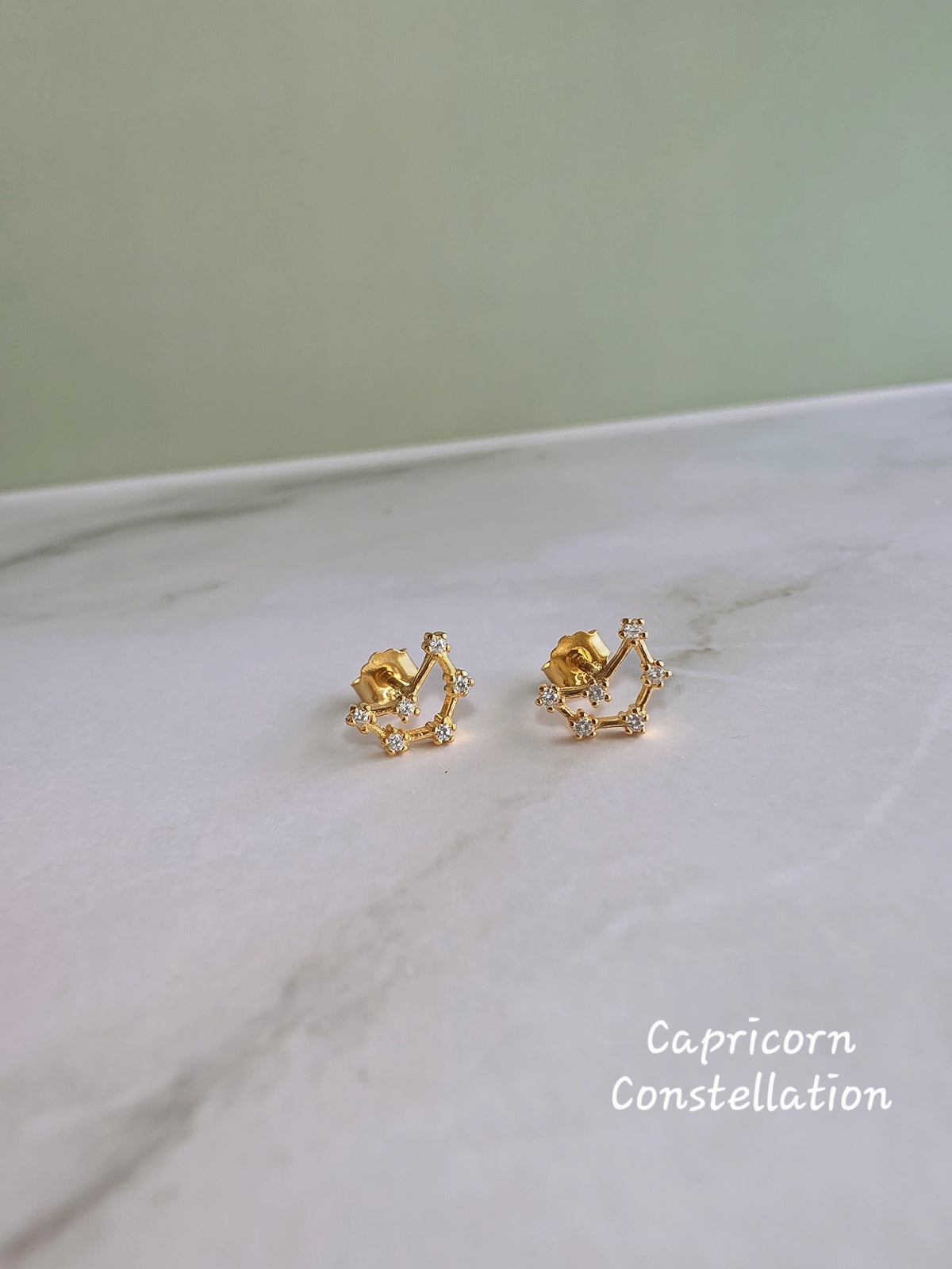 Elegant sterling silver constellation earrings for astrology lovers.