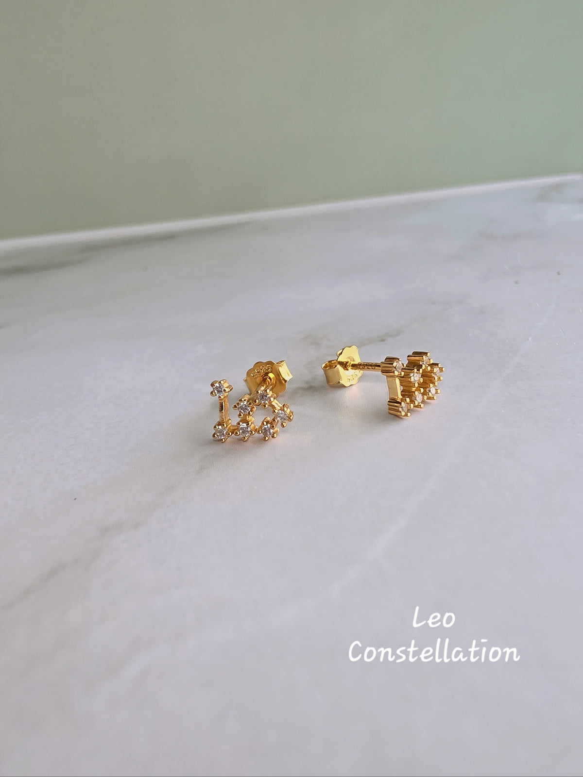 Constellation stud earrings with a timeless celestial design.