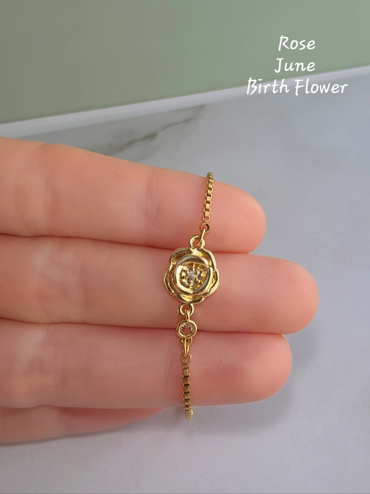 Minimalist adjustable birth flower bracelet for everyday wear.