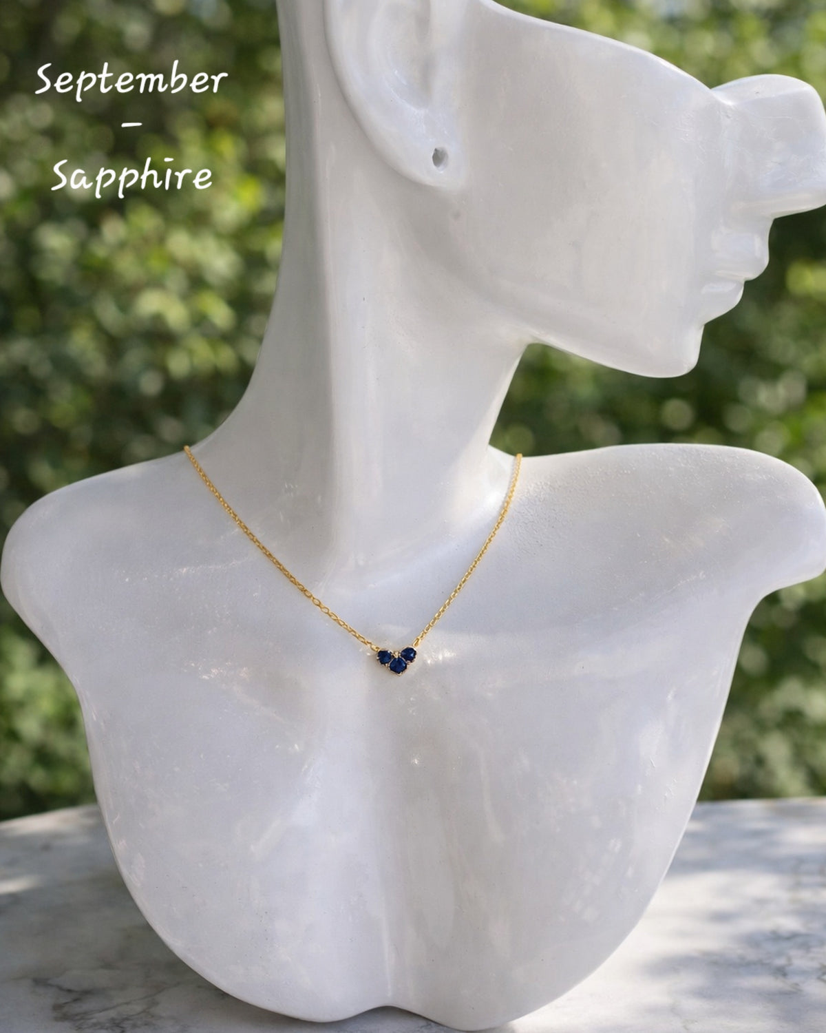 Heart birthstone necklace crafted from 925 sterling silver with 18K gold plating.