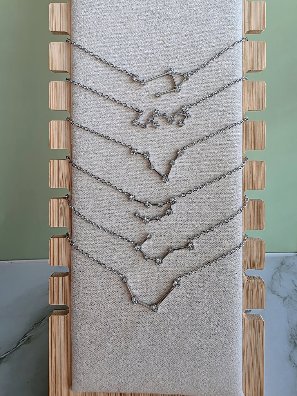 Constellation pendant necklace inspired by the zodiac signs.