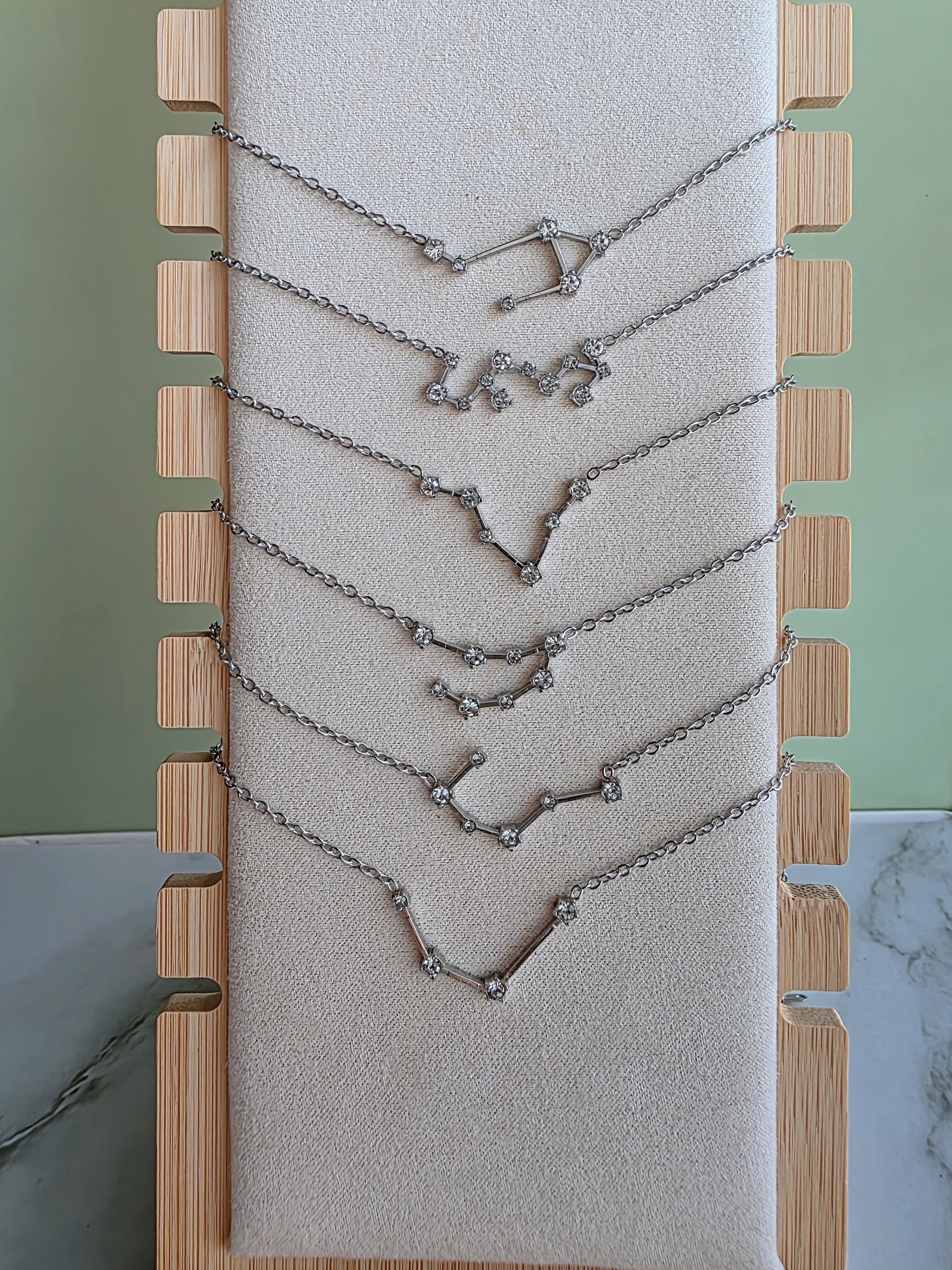 Constellation pendant necklace inspired by the zodiac signs.