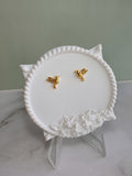 Gold hummingbird stud earrings for everyday wear.