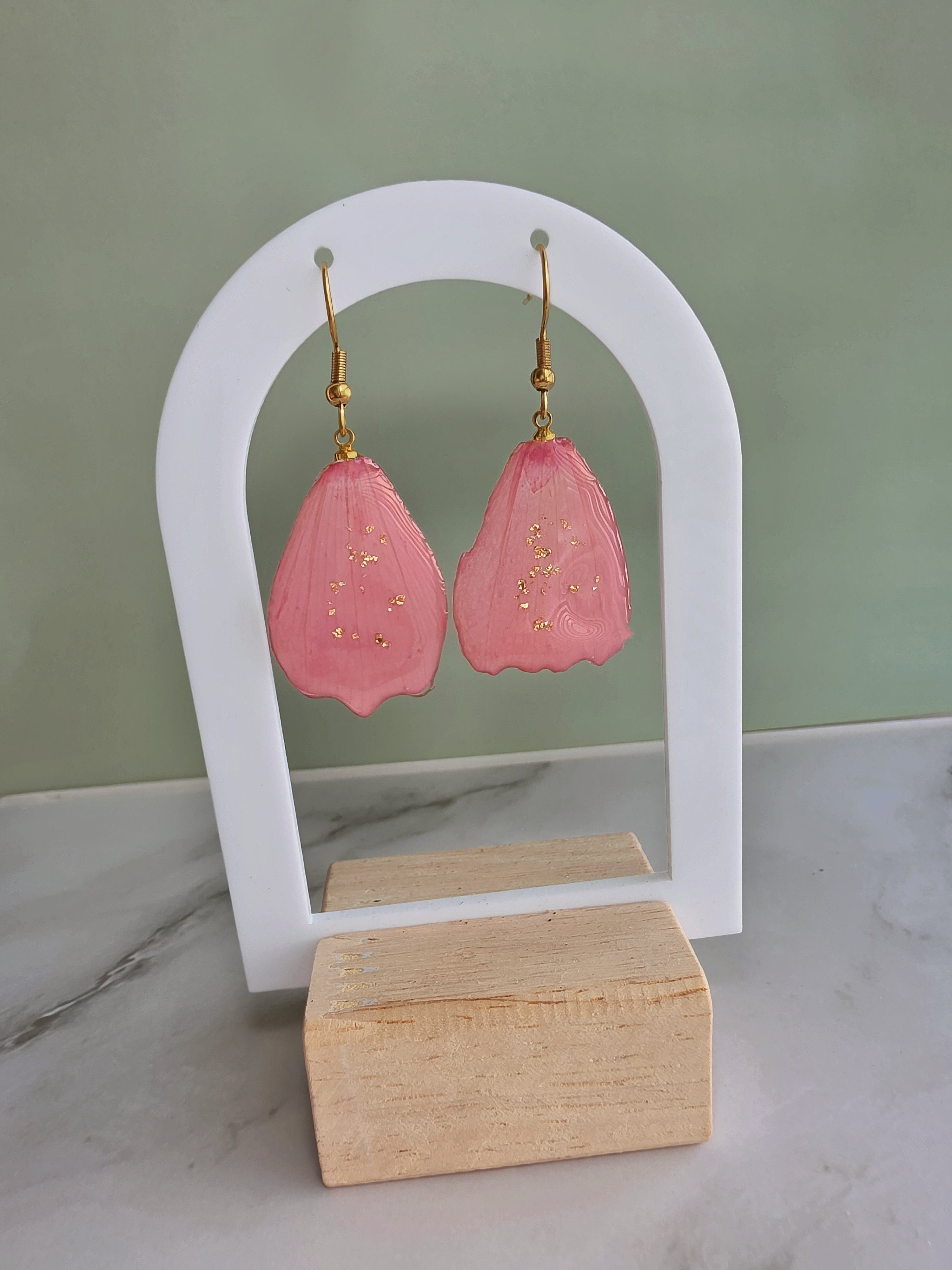 Red rose preserved flower earrings in a botanical dangle design.