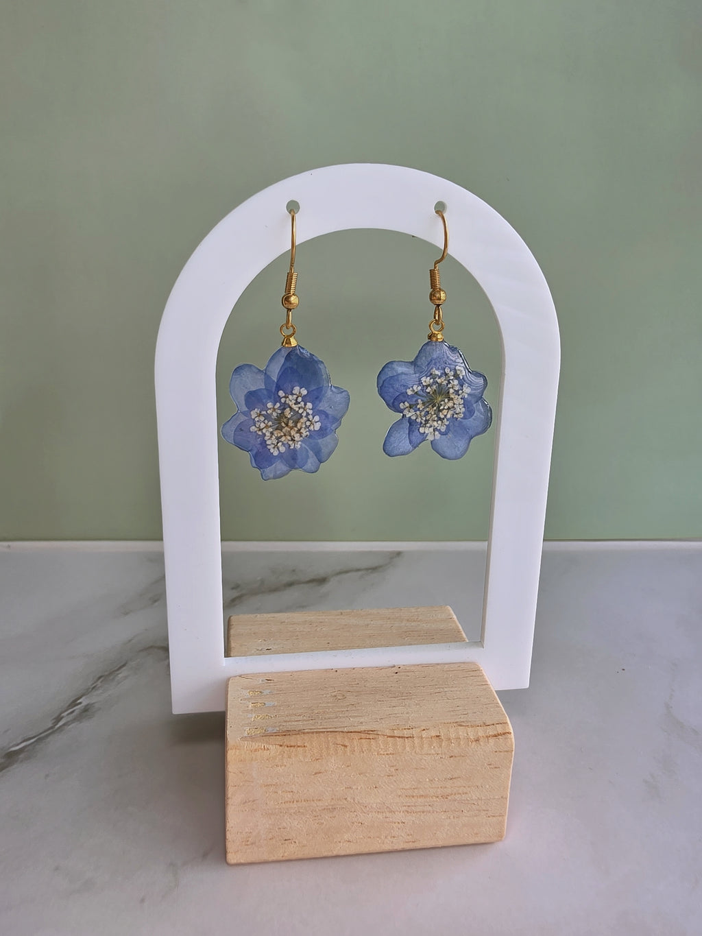 Blue hydrangea pressed flower earrings handcrafted with real flowers.