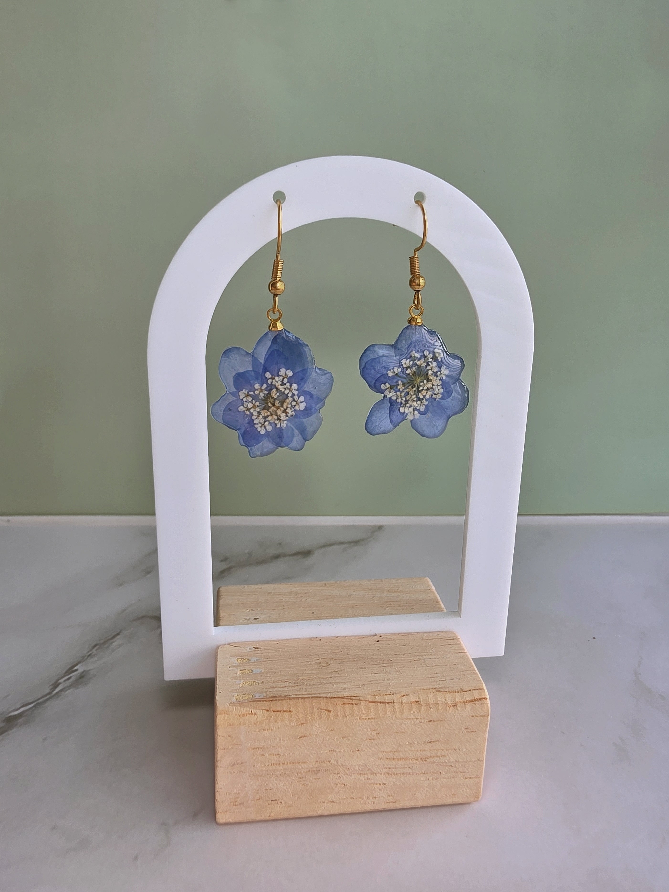 Blue hydrangea pressed flower earrings handcrafted with real flowers.