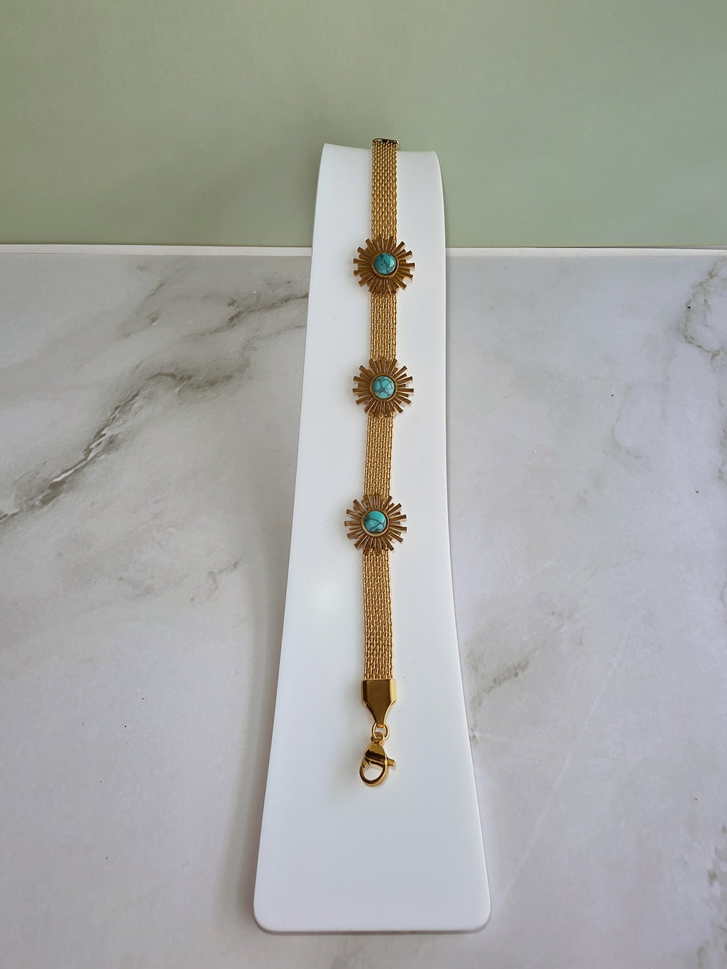 Elegant boho sunflower bracelet with an adjustable gold mesh chain.