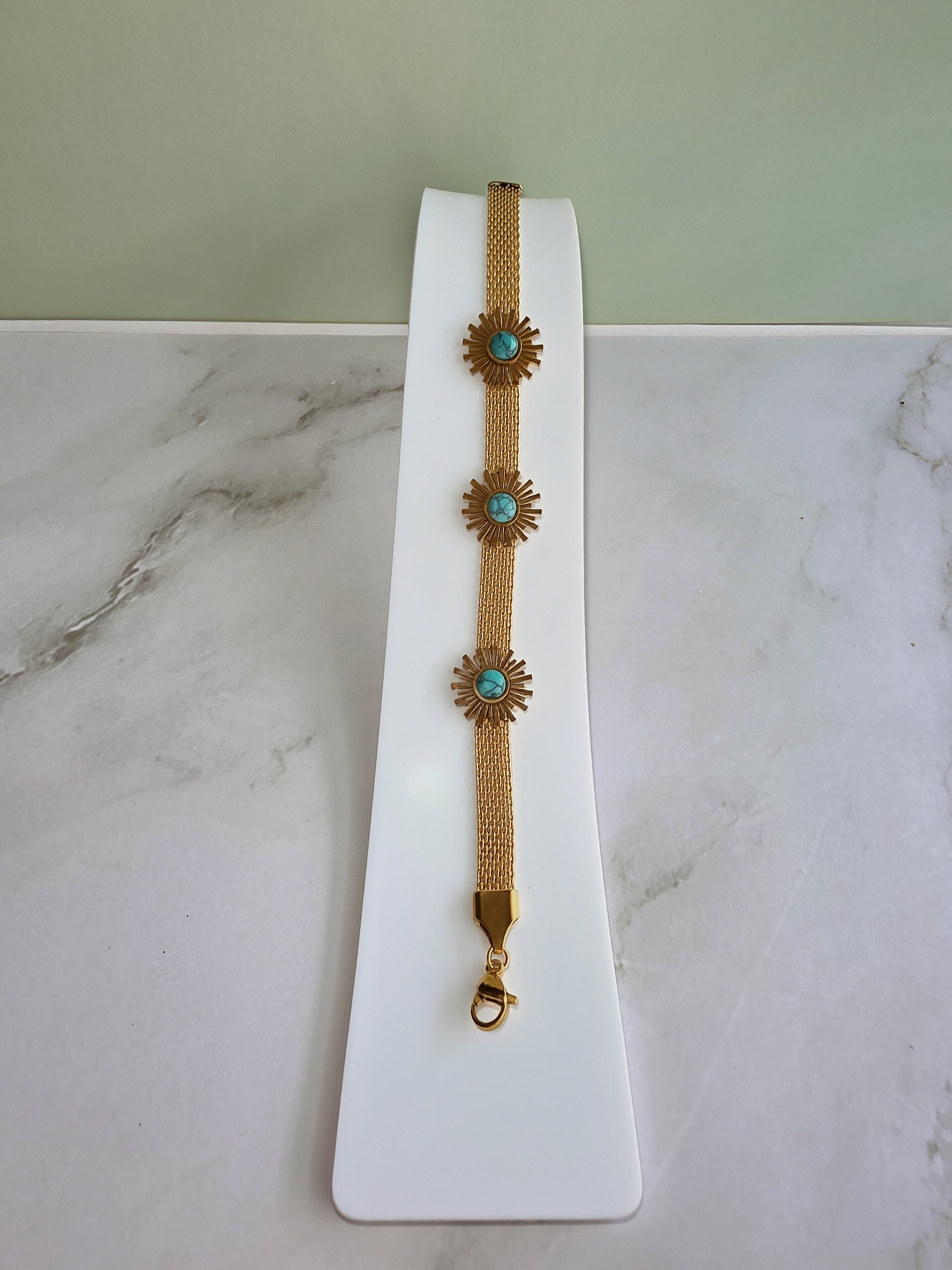 Elegant boho sunflower bracelet with an adjustable gold mesh chain.