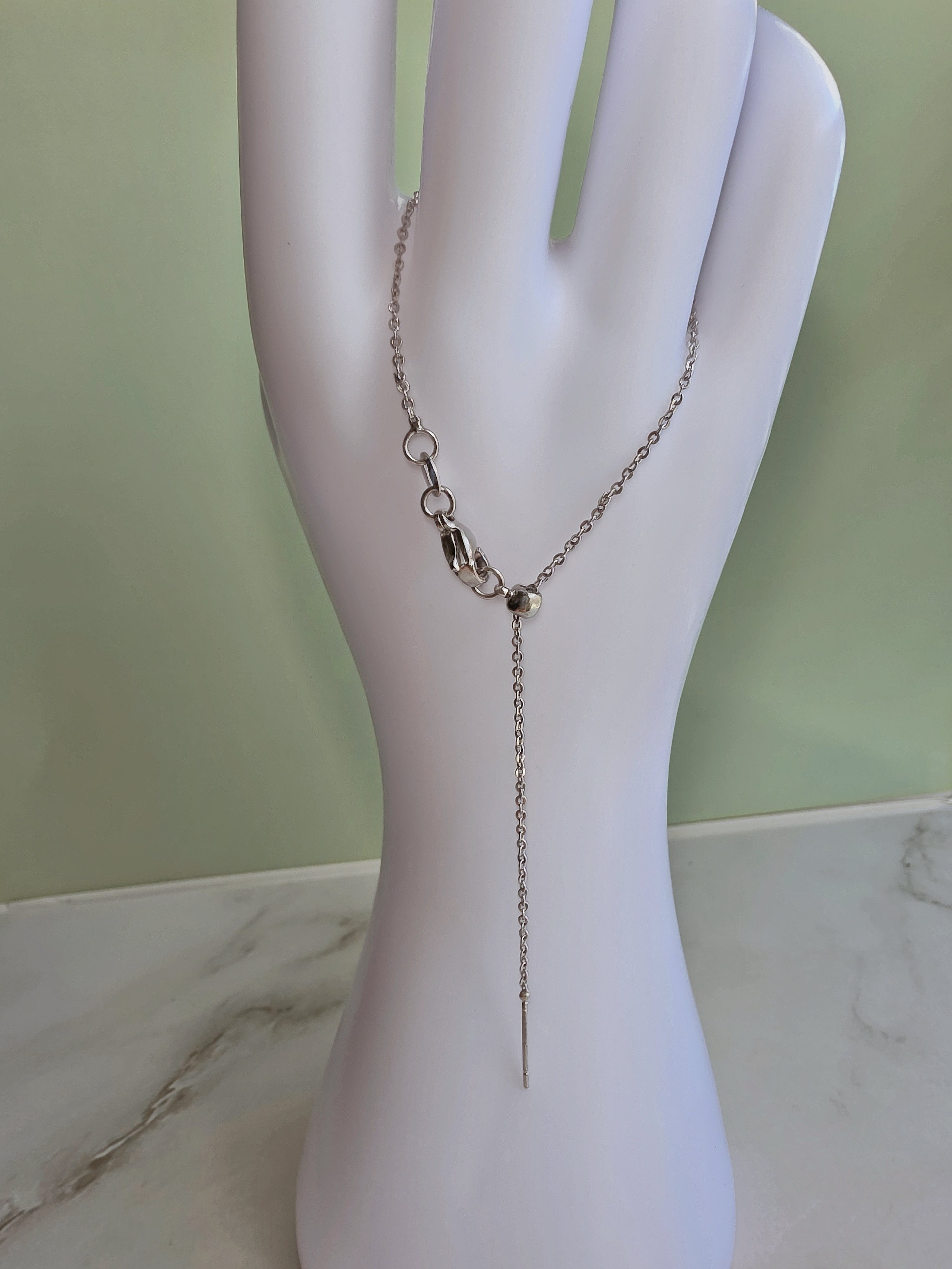 Elegant green gemstone mushroom necklace with a gold-plated chain.