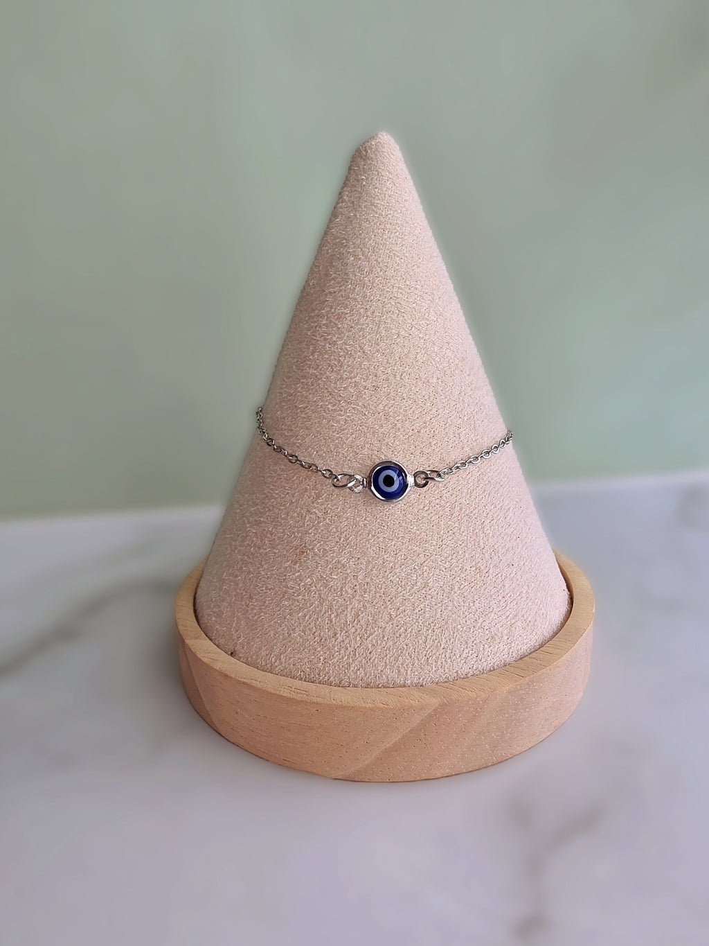 Minimalist lucky Evil Eye bracelet with a polished gold-plated finish.