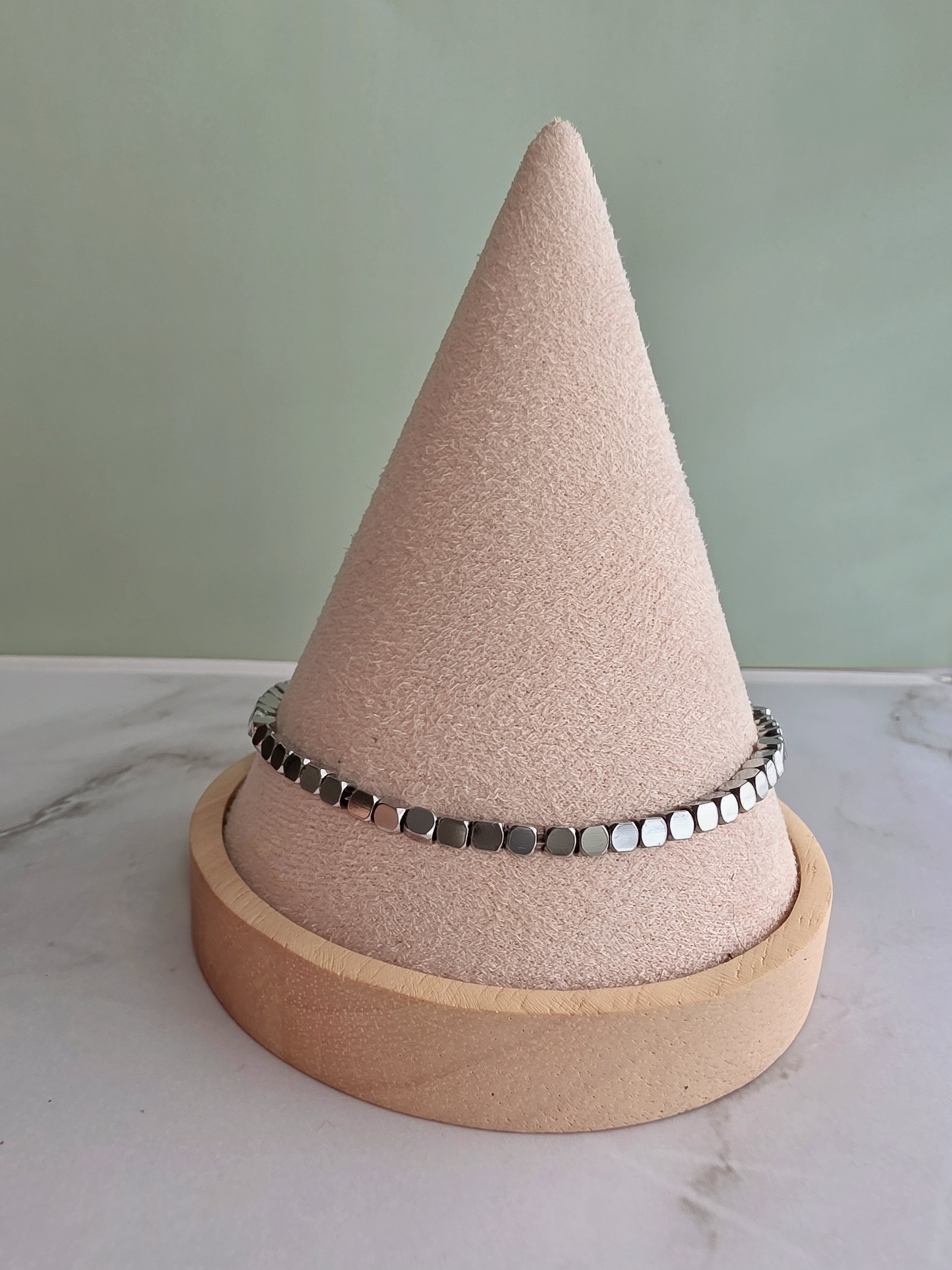 Silver beaded anklet featuring a durable non-tarnish finish.