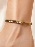 Dainty beaded anklet with a 14K gold-plated non-tarnish finish.