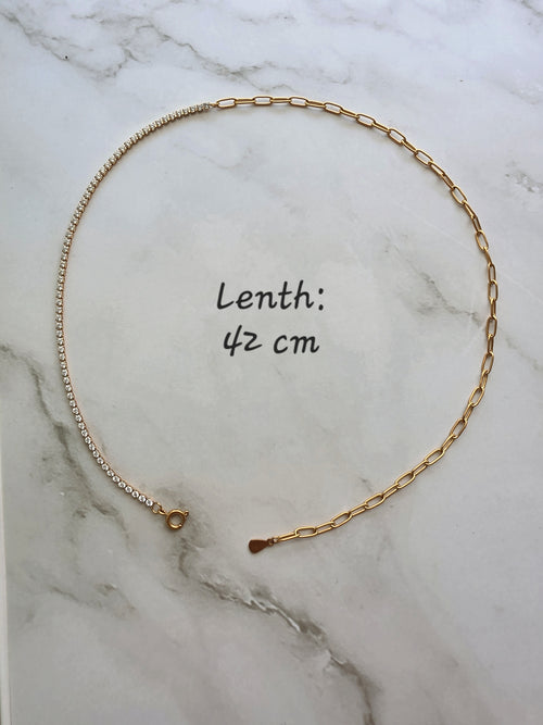 Non-tarnish gold paperclip chain choker featuring a delicate tennis necklace design.