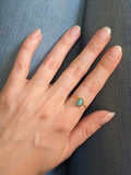 Women's turquoise gemstone ring with a durable non-tarnish gold finish.