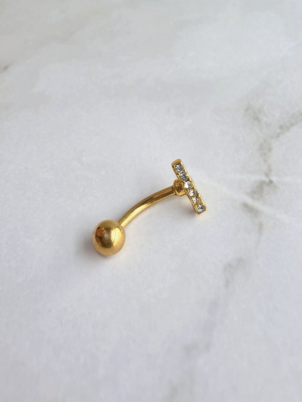 Modern non tarnish belly rings for everyday wear.