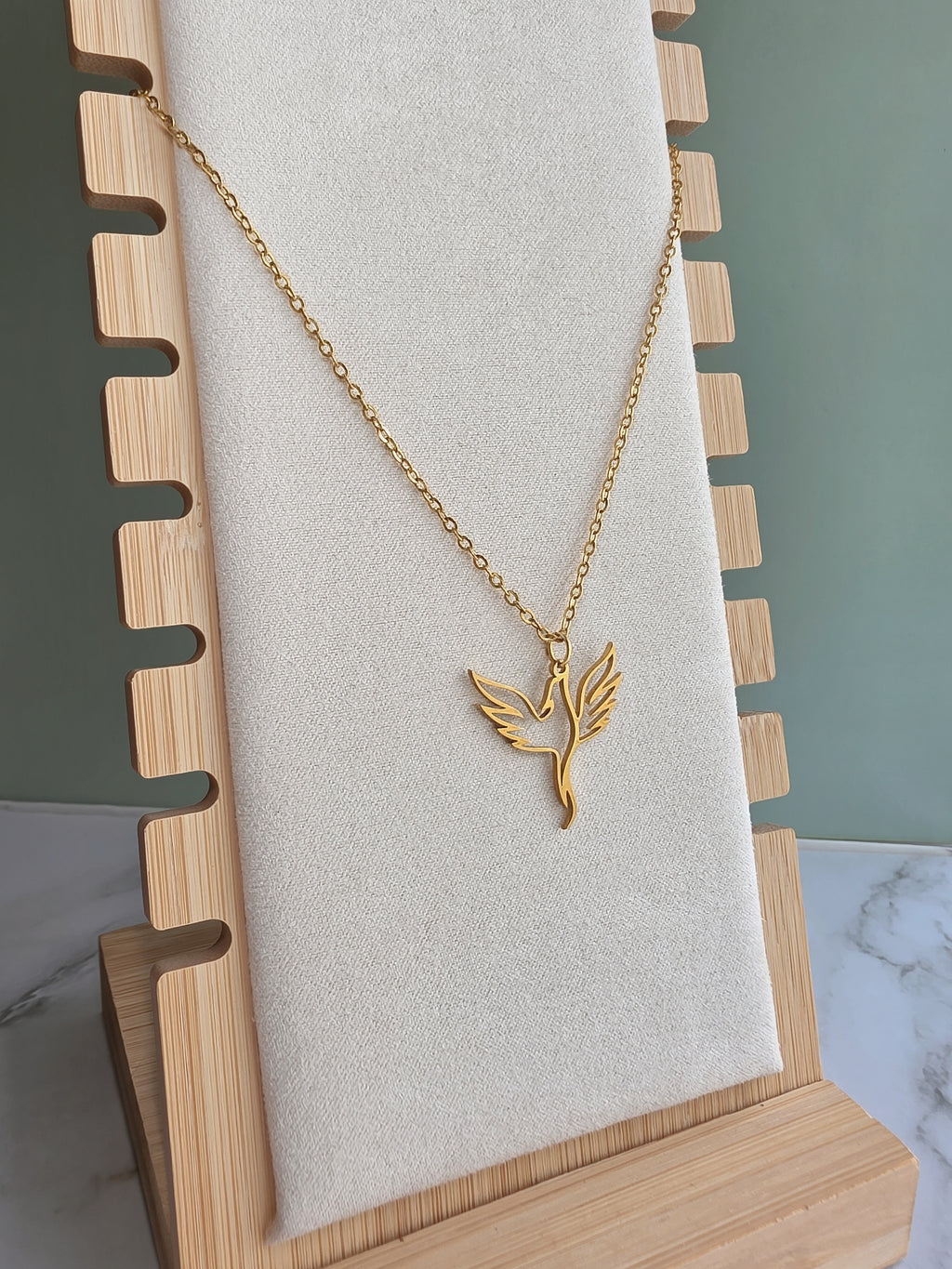 Non tarnish phoenix necklace for everyday wear.